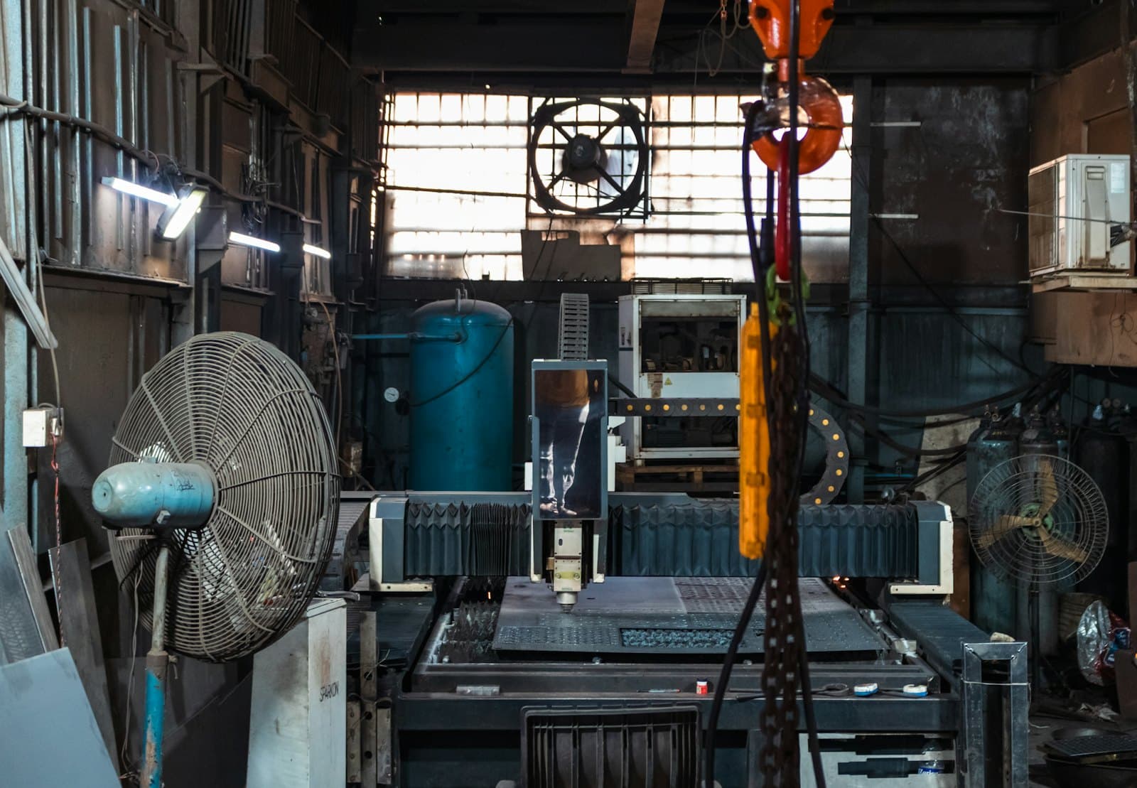 Industrial machine shop floor, the kind of borrower a commercial broker packages